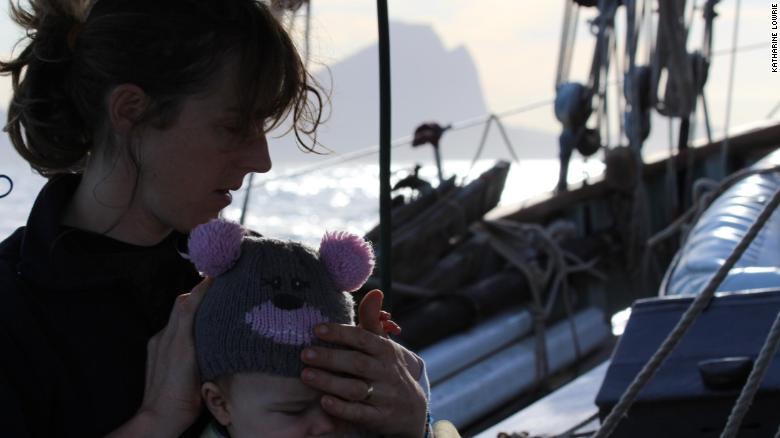 Couple sailing the world with a baby